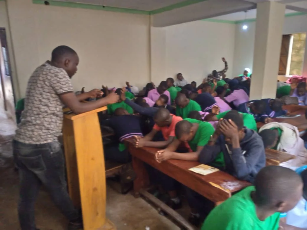 Students participating in a discipleship session