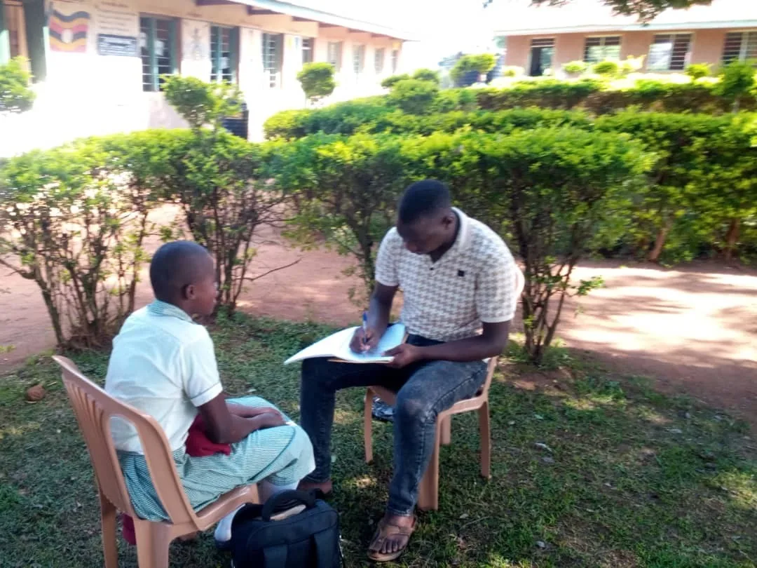 Team member holding a one-to-one support session with a student